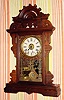 C.1880, Seth Thomas Clock Co., "Eclipse", 8-day time/strike/alarm walnut shelf clock.