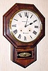 C.1880, E. N. Welch Mfg, Forestville, Conn, SHORT DROP OCTAGON, 12" dial in rosewood, 8-day time and strike.