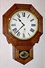 C.1901, Ansonia "DROP OCTAGON B", eight day timepiece, in a sold oak case.