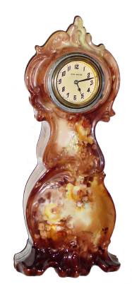 C.1920, Alice Hyatt, (signed on rear) 30-hour porcelain mantel timepiece, mini French grandfather motif. — Antique Clocks Price Guide
