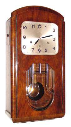 C.1935-40, German, Junghans, 8-day time, Westminster chime, plus strike, wall clock in a walnut art deco case. — Antique Clocks Price Guide
