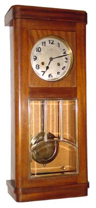 C.1920, German, Junghans, 8-day time and strike wall clock in a mahogany art Deco case. — Antique Clocks Price Guide