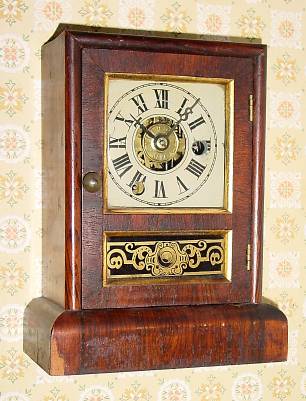 C.1855, Seth Thomas, Plymouth Hollow, COTTAGE E, 1-Day, time and alarm mini cottage clock, mahogany. — Antique Clocks Price Guide