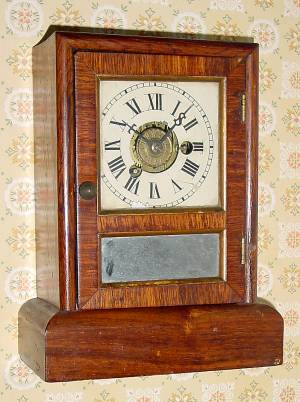 C.1870, Seth Thomas, Thomaston, COTTAGE E, 1-Day, time and alarm mini cottage clock, in rosewood. — Antique Clocks Price Guide
