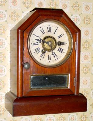 C.1880, Seth Thomas, Thomaston, COTTAGE A, 1-Day, time and alarm mini cottage clock, in walnut. — Antique Clocks Price Guide