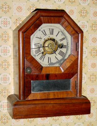 C.1870, Seth Thomas, Thomaston, COTTAGE D, 1-Day, time and alarm mini cottage clock, in rosewood. — Antique Clocks Price Guide