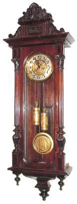 C.1905, Czech, Gustav Becker, 2-Wt, Vienna Regulator, in a dark walnut case, with some old worm damage in top molding, rod strike. — Antique Clocks Price Guide