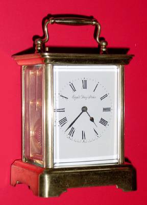 C.1920, New Haven Clock Co., "EDMUND", 8-day time and strike, brass cased carriage clock. — Antique Clocks Price Guide