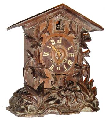 C.1915, German, Black Forest Shelf Cuckoo, forest motif, with new rear dust cover, and less top trim. — Antique Clocks Price Guide