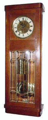 C.1905, German, Gustav Becker, 2-Wt, Box Regulator, 8-day time and rod strike, in a dark walnut case with beveled glass door. — Antique Clocks Price Guide