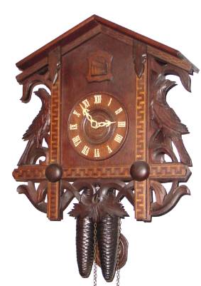 C.1925, German, 2-Wt Cuckoo, in an earlier style case with cross banded/ geometric inlay. — Antique Clocks Price Guide