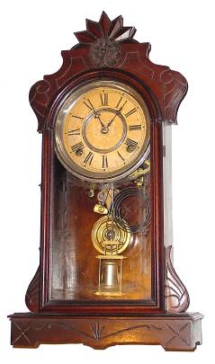 C.1885, Mixed Lot: A Gilbert ARGUS walnut case, now with a signed Kroeber C.1875 (pat Oct 6, 1870) time and strike movement, gong and pend. — Antique Clocks Price Guide