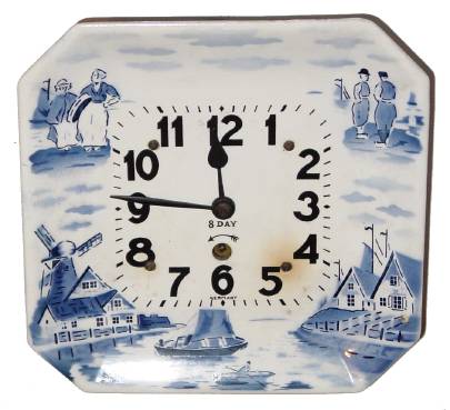 C.1930 German, 8-day blue and white porcelain plate wall timepiece. — Antique Clocks Price Guide