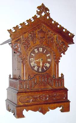 C.1920, German, G. Hettich and Sohn, Shelf Cuckoo, large, in an oak case with carved trim and a top rail, Eight Day. — Antique Clocks Price Guide