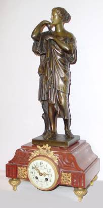 C.1900, French, Bernard Lyov, a Paris, red marble and ormolu base, with an EARLIER bronze female figure in classical robes, 8-day bell strike. — Antique Clocks Price Guide
