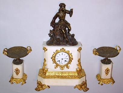 C.1900, French, Bronze and White Marble Figural clock set of who appears to be Christopher Columbus, with an 8-day bell strike round movement with porcelain dial and moon hands. — Antique Clocks Price Guide