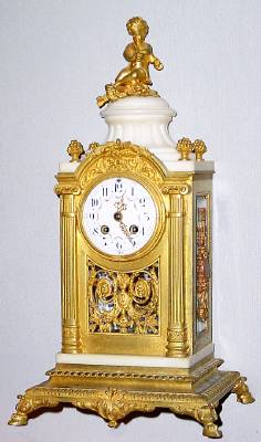 C.1880, French, Vincenti and Cie, Ormolu and Marble Crystal Regulator, with beveled glass sides, and domed top, surmounted by a flute playing putti, 8-day gong strike. — Antique Clocks Price Guide