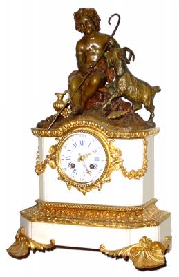 C.1840, French, Henry Marc, a Paris, Bronze and White Marble figural clock, a Shepard boy with goat, seated with grapes and a jug, and a pan flute near him on the ground. — Antique Clocks Price Guide