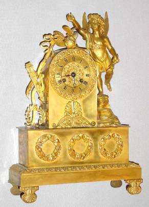 C.1830, French, Ormolu Figural Clock with Dome, Putti with Butterfly, 8-day time and bell strike, with silk thread suspension. — Antique Clocks Price Guide