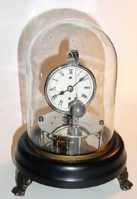C.1878, E. N. Welch Mfg. Co., "Briggs Rotary", 30-hour novelty timepiece, deluxe nickeled version. — Antique Clocks Price Guide