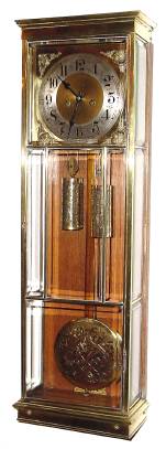 C.1920, Junghans, 2-Wt Moderne Regulateur, in a brass and beveled glass case. — Antique Clocks Price Guide