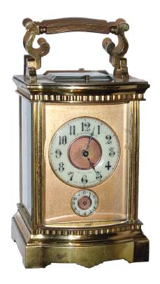 C.1900, French, for J. E. Caldwell, Philadelphia, brass cased carriage clock, Angle Riche style with bow front, time, strike, repeat and alarm. — Antique Clocks Price Guide