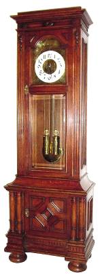 C.1900, Austrian, 2-Wt, 30-Day Floor clock, in a walnut 2 piece case (separates below door), and with arch dial, engraved dial center, weights and pendulum. — Antique Clocks Price Guide
