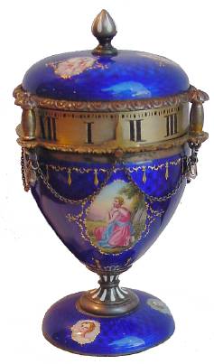 C.1900, Austrian, Mini Urn with Annular Dial, blue cobalt enamel over silver case, and with 6 little cameos, and a Swiss stem wind movement. — Antique Clocks Price Guide