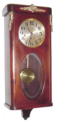C.1910, French, Westminster Chime wall clock, in mahogany with cast ormolu trim and oval beveled glass in door. — Antique Clocks Price Guide