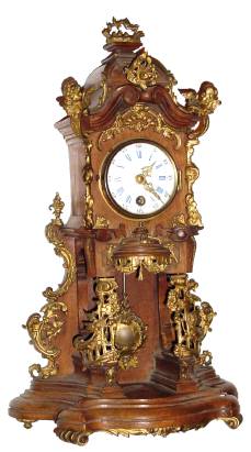 C.1880, Lenzkirch, Small Open Well mantel timepiece, 8-day, walnut with profuse cast brass adornments. — Antique Clocks Price Guide