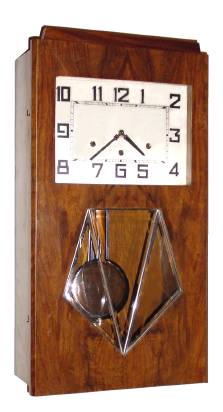 C.1950, German for the French Market, 8-day time, Westminster chime, plus strike wall clock in a walnut art Deco case. — Antique Clocks Price Guide