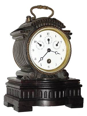 C.1890, French, Unsigned Calendar Desk timepiece, case of mahogany and iron, 8-day cylinder platform escapement. — Antique Clocks Price Guide