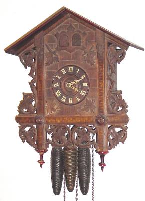 C.1900 German, Cuckoo and Quail, 30-hour time/strike wall clock, less top rail and pendulum. — Antique Clocks Price Guide