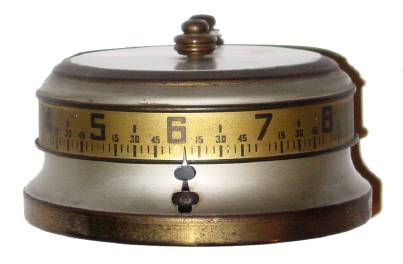 C.1940, Lux Manufacturing Co., "Rotary Clock" or more commonly call the tape measure clock 30-hour annular dial timepiece. — Antique Clocks Price Guide