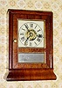 C.1855, Seth Thomas, Plymouth Hollow, MINI COTTAGE, 1-Day, time and alarm mini cottage clock, mahogany flat top with pine sides.