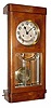 C.1910, German, Unmarked Box Clock, 8-day time and strike in a light walnut case with 4 heavy panes of beveled glass in the door.