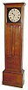 Mixed lot: C.1920, a paneled oak cabinet, now with an Ithaca, NY chain drive, 8-day striking movement, mounted on wooden blocks, with new paper dial, and the cabinet secured to a plinth from a C.1840 tall case clock.