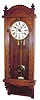 C.1891, Waterbury, Regulator No. 3 (?), 2-weight, timepiece in an oak case.