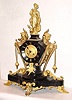 C.1890, French, A. Carlhian, 8 Beaumetz, Paris, Fantasy figural clock case, ormolu and black marble, 8-day time and bell strike.