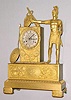 C.1825, French, Ormolu Figural Clock, ADRASTE, Roman Warrior with woven leather skirt and body armor, lance in his left hand, pointing to his shield with his right hand, 8-day time and bell strike, silk thread.