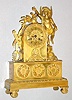 C.1830, French, Ormolu Figural Clock with Dome, Putti with Butterfly, 8-day time and bell strike, with silk thread suspension.
