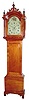 C.1805, L. and A. Hutchins, Concord, NH, 8-day, 2-weight, maple tall case clock, with bracket feet, fretwood top, and a nice amount of tigering in the wood.