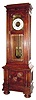 C.1900, Austrian, 2-Wt, 30-Day Floor clock, in a walnut 2 piece case (separates below door), and with arch dial, engraved dial center, weights and pendulum.