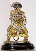 C.1870, English Skeleton Clock, 2-Chain fusee, striking the hours on a bell, 8-day with glass dome.