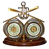 C.1885, French, Nautical Novelty "Grace Darling", a desk composite that includes a compass, 2 life preservers with rope handles, a pair of oars, an anchor with chain and a thermometer, and with rope all around the edge of the oak base.