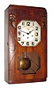 C.1920, France, Girod, Veritable, 8-day time, Westminster chime, plus strike, wall clock in a walnut art Deco case.