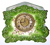 C.1904 William L. Gilbert Clock Co., "No. 432", 8-day time/strike porcelain mantel clock in green with pink flowers.