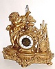 C.1890, French, Striking Conical Pendulum clock, figure of a cherub standing beside the clock, holding the pendulum in his hand.