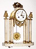 C.1890, French, S. Marti, Marble and Ormolu portico clock with sunburst pendulum and porcelain dial.