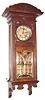 C.1900, German, 8-day time/strike wall clock, Art Nouveau influence, with matching gilt pendulum and dial center, and 6 panes of heavy beveled glass in the door .